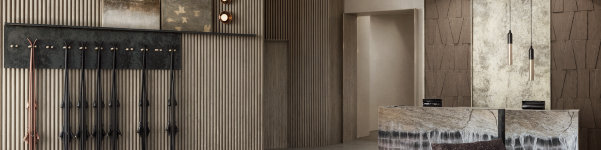 The image shows a modern interior with sleek furniture, a textured wall, artistic lighting, and a reception desk, creating a chic ambiance.