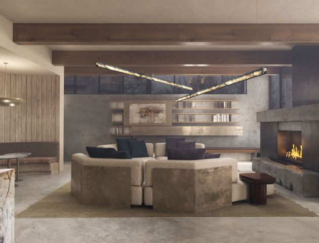 Modern concrete living room with sectional sofa, hanging pendant, wall shelves, and a lit fireplace.